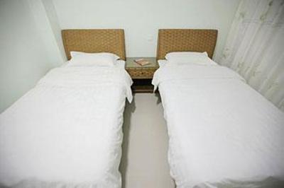 фото отеля Fenghuang Rujia Holiday Apratment Dadonghai Branch