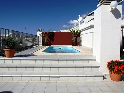 фото отеля Apartamentos Plaza Cavana 5