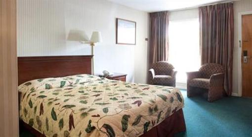 фото отеля Carriage House Studio Apartments