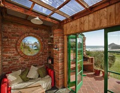 фото отеля Bethells Beach Cottages