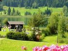 фото отеля Ferienhaus Winkler Tuschnig Pension Weissensee