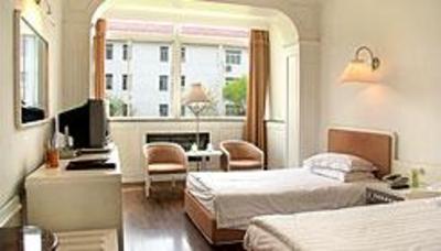 фото отеля Qingdao Garden Hotel