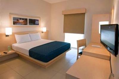 фото отеля City Express Playa del Carmen