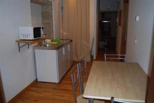 фото отеля Apartamentos Turisticos Un Coma Oito Santiago De Compostela