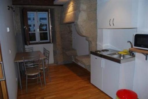 фото отеля Apartamentos Turisticos Un Coma Oito Santiago De Compostela