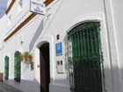 фото отеля Hostal El Arco Conil de la Frontera