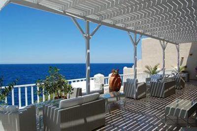 фото отеля Hotel and Studios Cavos Bay