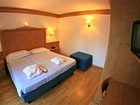 фото отеля Hotel Medil Campitello di Fassa