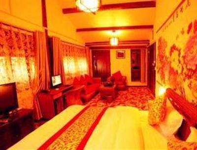 фото отеля Pao Zai Lijiang Inn