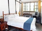 фото отеля Wuzhen Guest House Tongxiang