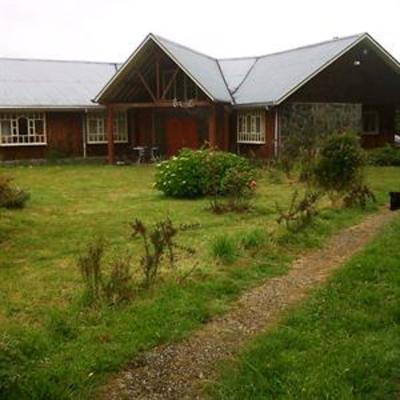 фото отеля Ecohostal Huellas del Bosque