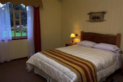 фото отеля Ecohostal Huellas del Bosque