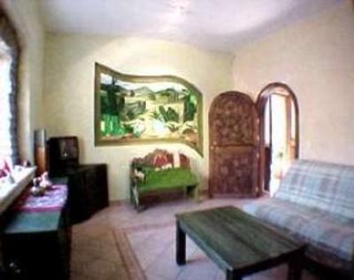 фото отеля La Casa del Pirul - Boutique Villas Xichu