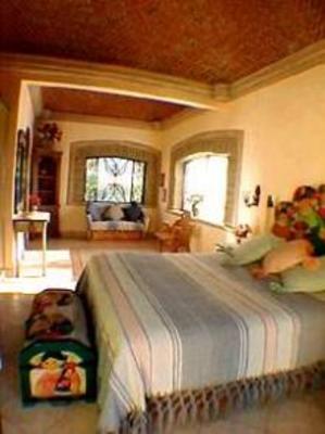 фото отеля La Casa del Pirul - Boutique Villas Xichu