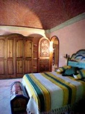 фото отеля La Casa del Pirul - Boutique Villas Xichu