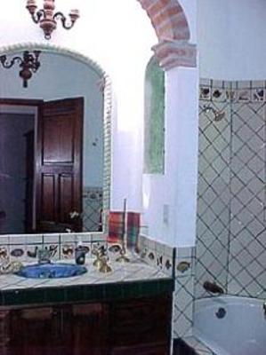 фото отеля La Casa del Pirul - Boutique Villas Xichu