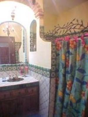 фото отеля La Casa del Pirul - Boutique Villas Xichu
