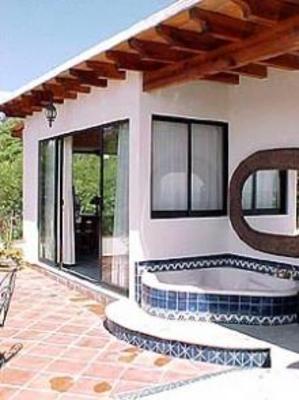 фото отеля La Casa del Pirul - Boutique Villas Xichu
