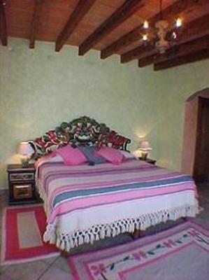 фото отеля La Casa del Pirul - Boutique Villas Xichu