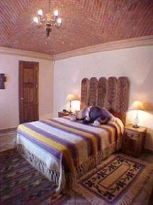 фото отеля La Casa del Pirul - Boutique Villas Xichu