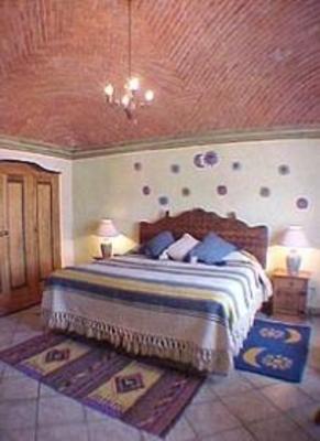 фото отеля La Casa del Pirul - Boutique Villas Xichu