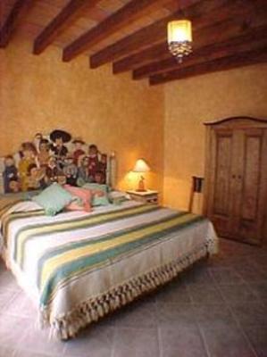 фото отеля La Casa del Pirul - Boutique Villas Xichu