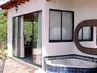 фото отеля La Casa del Pirul - Boutique Villas Xichu