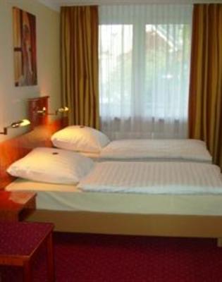 фото отеля Hotel am Berliner Platz