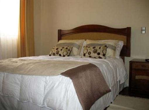 фото отеля AMS Apartments Huérfanos