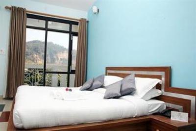 фото отеля Corbett Gateway Resort Ramnagar