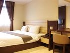 фото отеля Travellers Suites Hotel Sumatera Utara