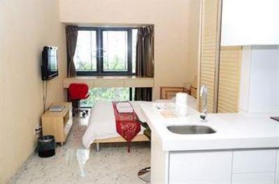 фото отеля Shengang Apartment Hotel Yuhedi