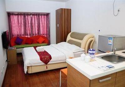фото отеля Shengang Apartment Hotel Yuhedi