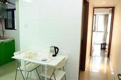 фото отеля Shengang Apartment Hotel Yuhedi
