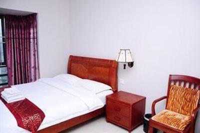фото отеля Shengang Apartment Hotel Yuhedi