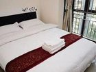 фото отеля Shengang Apartment Hotel Yuhedi