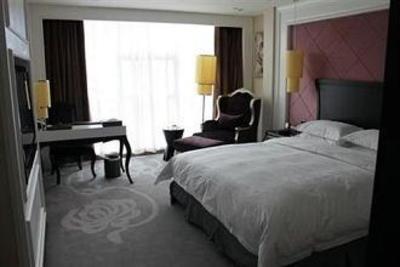 фото отеля Zhongzhou International Hotel Zhengzhou Weisan Road