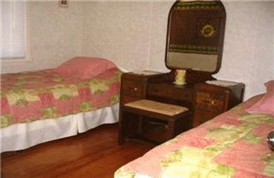 фото отеля Mile Beach Cottage 1