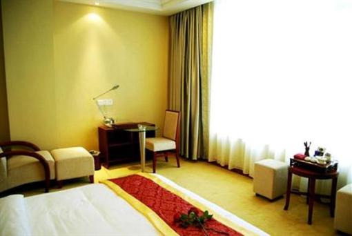 фото отеля Shengxing Business Hotel