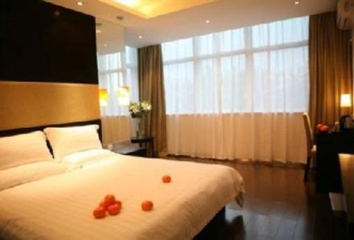 фото отеля Orange Hotel (Ningbo Huaishu Road)