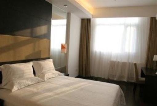фото отеля Orange Hotel (Ningbo Huaishu Road)