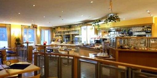 фото отеля Cafe and Hotel am Holzhafen