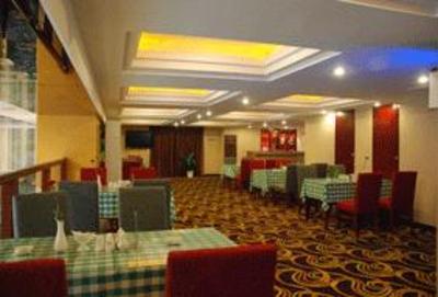 фото отеля Hollyear Inn Zhuzhou