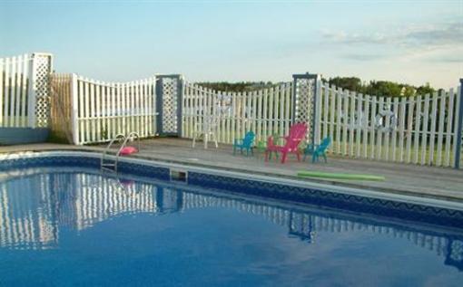 фото отеля Beach & Breeze Cottages
