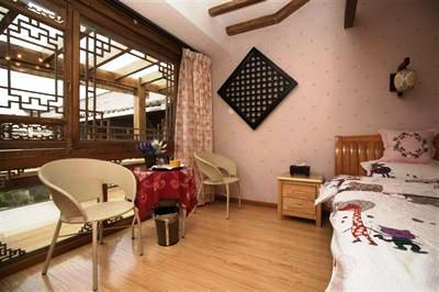 фото отеля Lijiang Shui An Bian Inn
