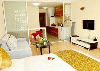 фото отеля Weihai Tujia Vacation Rental Lotte Century City Apartments