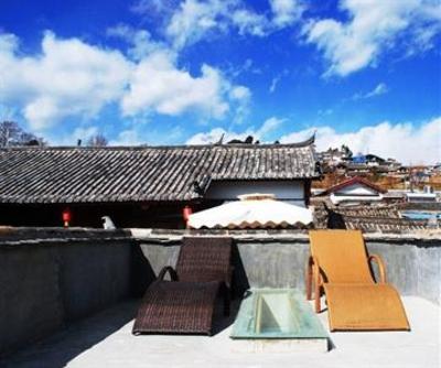 фото отеля Lijiang Flower Inn