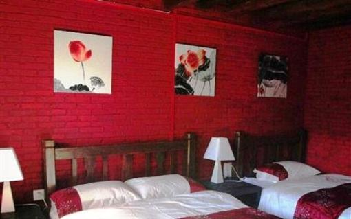 фото отеля Lijiang Flower Inn