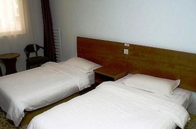 фото отеля Yijia Business Hotel Qingdao