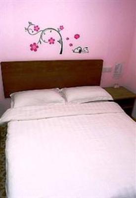 фото отеля Yijia Business Hotel Qingdao